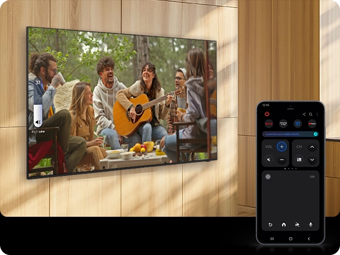 여성이 TV 노래방 기능을 활용하여 노래를 부르고 있습니다.
